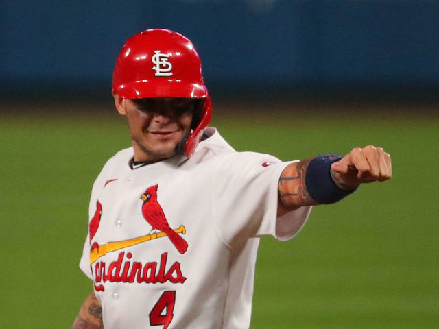 ST LOUIS, MO - SEPTEMBER 24: Yadier Molina #4 of the St. Louis Cardinals acknowledges his teammates in the dugout after recording his 2,000th career hit with a single against the Milwaukee Brewers in the seventh inning at Busch Stadium on September 24, 2020 in St Louis, Missouri.