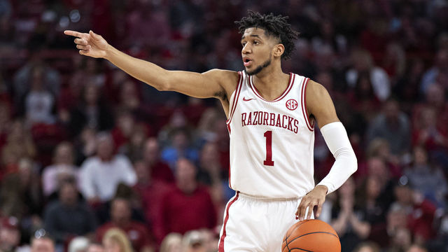 FAYETTEVILLE, AR - FEBRUARY 22: Isaiah Joe #1 of the Arkansas Razorbacks directs the offense during a game against the Missouri Tigers at Bud Walton Arena on February 22, 2020 in Fayetteville, Arkansas. The Razorbacks defeated the Tigers 78-68.