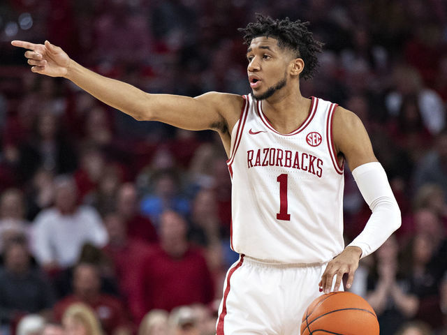 FAYETTEVILLE, AR - FEBRUARY 22: Isaiah Joe #1 of the Arkansas Razorbacks directs the offense during a game against the Missouri Tigers at Bud Walton Arena on February 22, 2020 in Fayetteville, Arkansas. The Razorbacks defeated the Tigers 78-68.