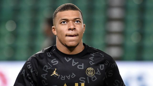 Paris Saint-Germain's French forward Kylian Mbappe looks on as he warms up before the French L1 football match between FC Nantes and Paris Saint-Germain at the La Beaujoire stadium in Nantes, western France on October 31, 2020.