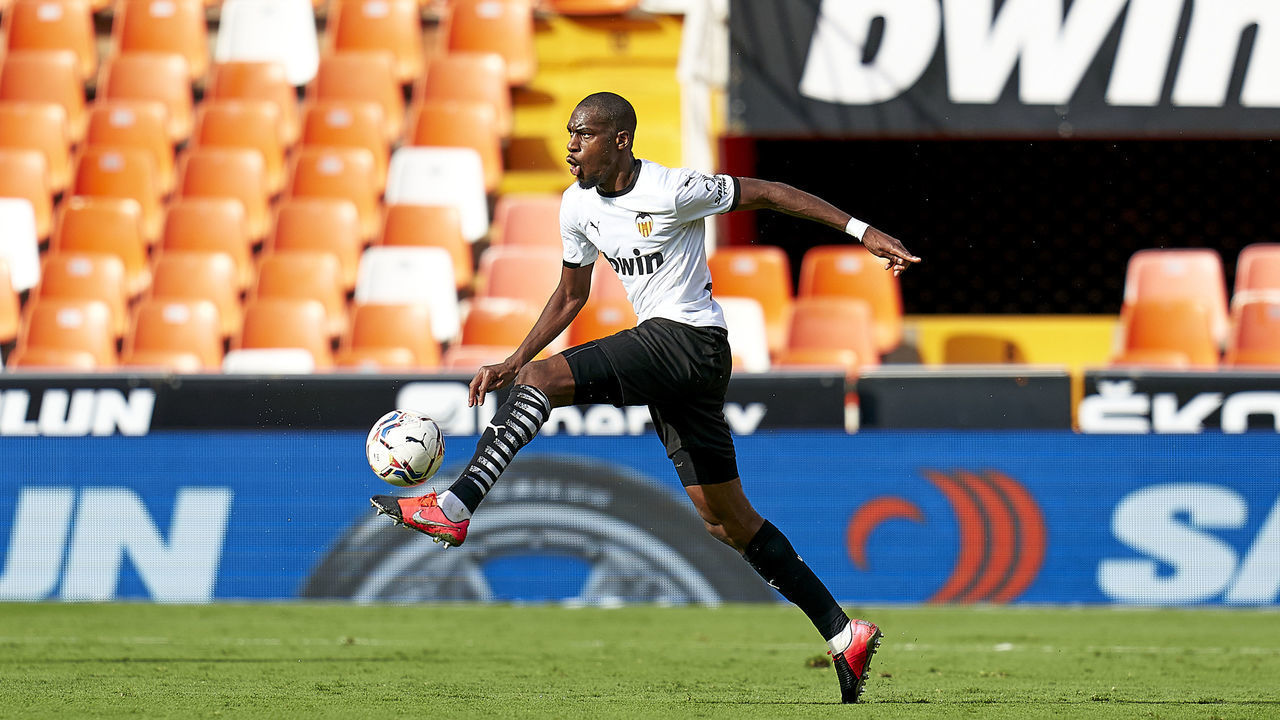 VALENCIA, SPAIN - SEPTEMBER 26: Geoffrey Kondogbia of Valencia CF with the ball during the La Liga Santader match between Valencia CF and SD Huesca at Estadio Mestalla on September 26, 2020 in Valencia, Spain.