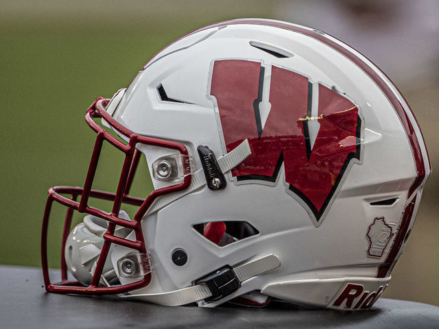MADISON, WI - SEPTEMBER 21: A Wisconsin Badger helmet sits on the training table durning a college football game between the Michigan Wolverines and the Wisconsin Badgers on September 21, 2019, at Camp Randall Stadium in Madison, WI.