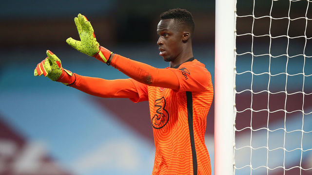 BURNLEY, ENGLAND - OCTOBER 31: Edouard Mendy of Chelsea during the Premier League match between Burnley and Chelsea at Turf Moor on October 31, 2020 in Burnley, England. Sporting stadiums around the UK remain under strict restrictions due to the Coronavirus Pandemic as Government social distancing laws prohibit fans inside venues resulting in games being played behind closed doors.