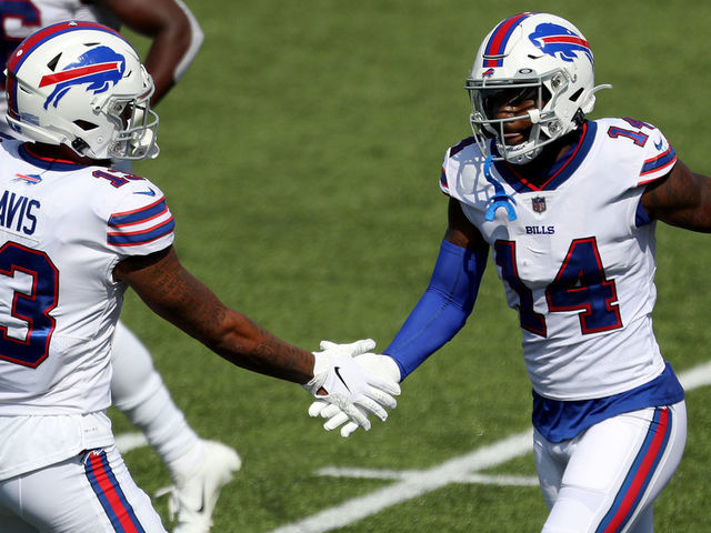 ORCHARD PARK, NEW YORK - SEPTEMBER 27: Gabriel Davis #13 of the Buffalo Bills slaps hands with teammate Stefon Diggs #14 after Diggs scored a touchdown during the first quarter against the Los Angeles Rams at Bills Stadium on September 27, 2020 in Orchard Park, New York.