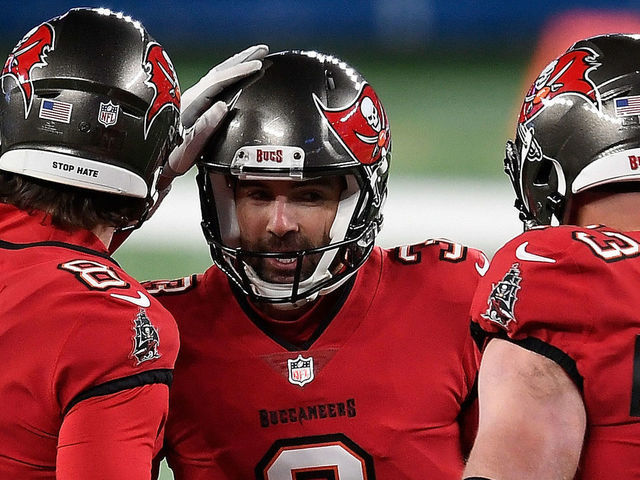 EAST RUTHERFORD, NEW JERSEY - NOVEMBER 02: Ryan Succop #3 of the Tampa Bay Buccaneers reacts after converting a field goal against the New York Giants in the first half with Bradley Pinion #8 and Joe Haeg #73 at MetLife Stadium on November 02, 2020 in East Rutherford, New Jersey.