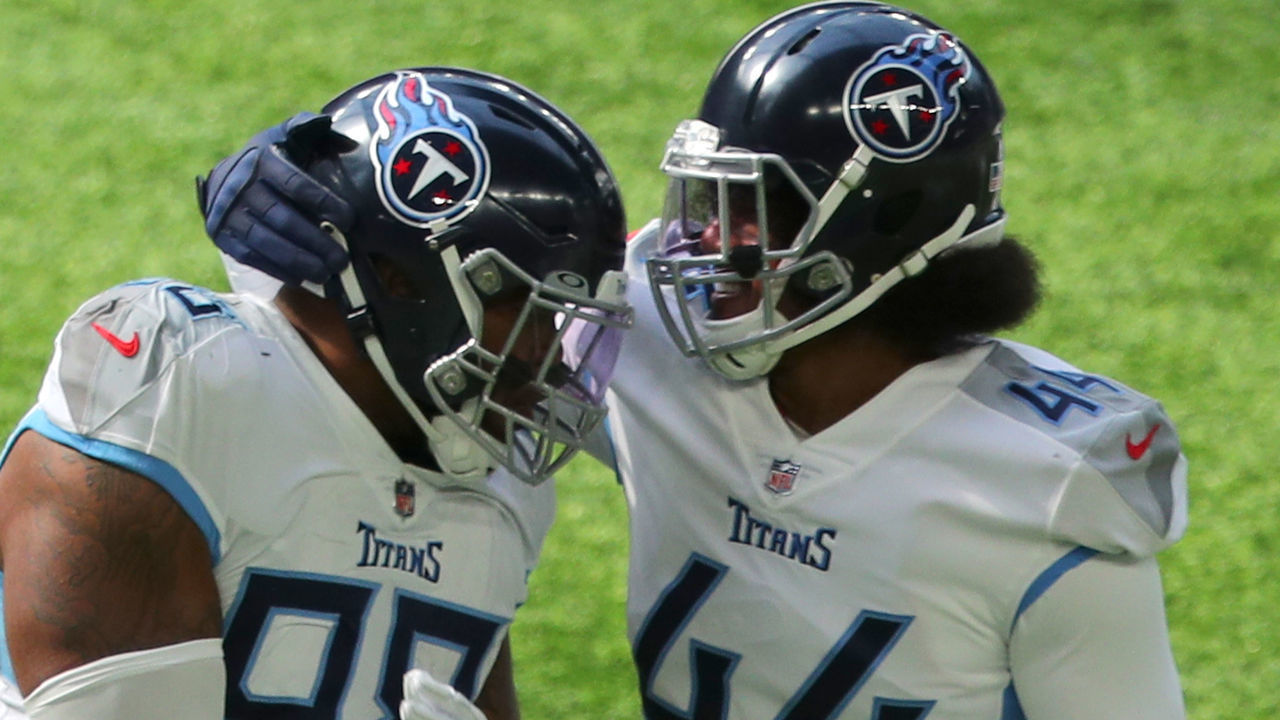 MINNEAPOLIS, MN - SEPTEMBER 27: Jeffery Simmons #98 celebrates his sack of Kirk Cousins #8 of the Minnesota Vikings with Vic Beasley #44 of the Tennessee Titans in the first quarter at U.S. Bank Stadium on September 27, 2020 in Minneapolis, Minnesota.