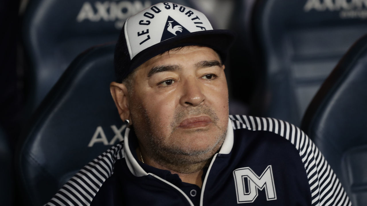 Argentine former football star Diego Maradona gestures during an homage before the start of the Argentina First Division 2020 Superliga Tournament football match Boca Juniors vs Gimnasia La Plata, at La Bombonera stadium, in Buenos Aires, on March 7, 2020.