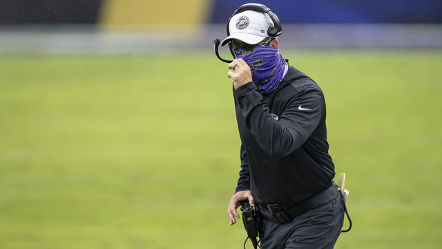 BALTIMORE, MD - OCTOBER 11: Head coach John Harbaugh of the Baltimore Ravens reacts to a play during the first half of the game against the Cincinnati Bengals at M&T Bank Stadium on October 11, 2020 in Baltimore, Maryland.