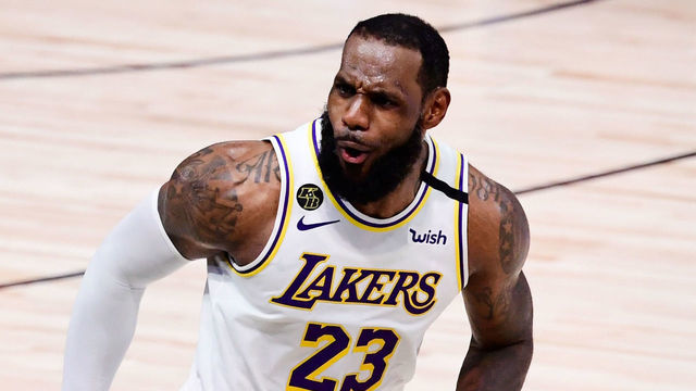 LAKE BUENA VISTA, FLORIDA - OCTOBER 11: LeBron James #23 of the Los Angeles Lakers reacts during the fourth quarter against the Miami Heat in Game Six of the 2020 NBA Finals at AdventHealth Arena at the ESPN Wide World Of Sports Complex on October 11, 2020 in Lake Buena Vista, Florida.