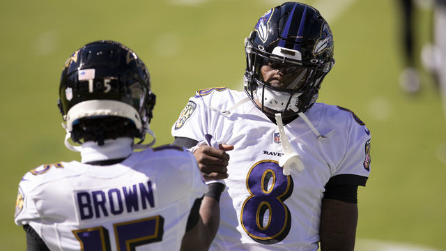 PHILADELPHIA, PA - OCTOBER 18: Marquise Brown #15 and Lamar Jackson #8 of the Baltimore Ravens embrace prior to the game against the Philadelphia Eagles at Lincoln Financial Field on October 18, 2020 in Philadelphia, Pennsylvania.