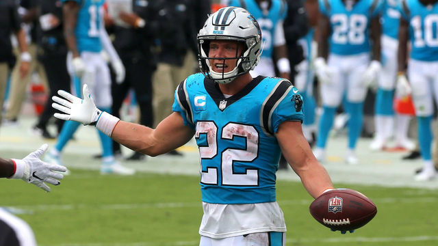 TAMPA, FL - SEP 20: Christian McCaffrey (22) of the Panthers celebrates a touchdown during the regular season game between the Carolina Panthers and the Tampa Bay Buccaneers on September 20, 2020 at Raymond James Stadium in Tampa, Florida.