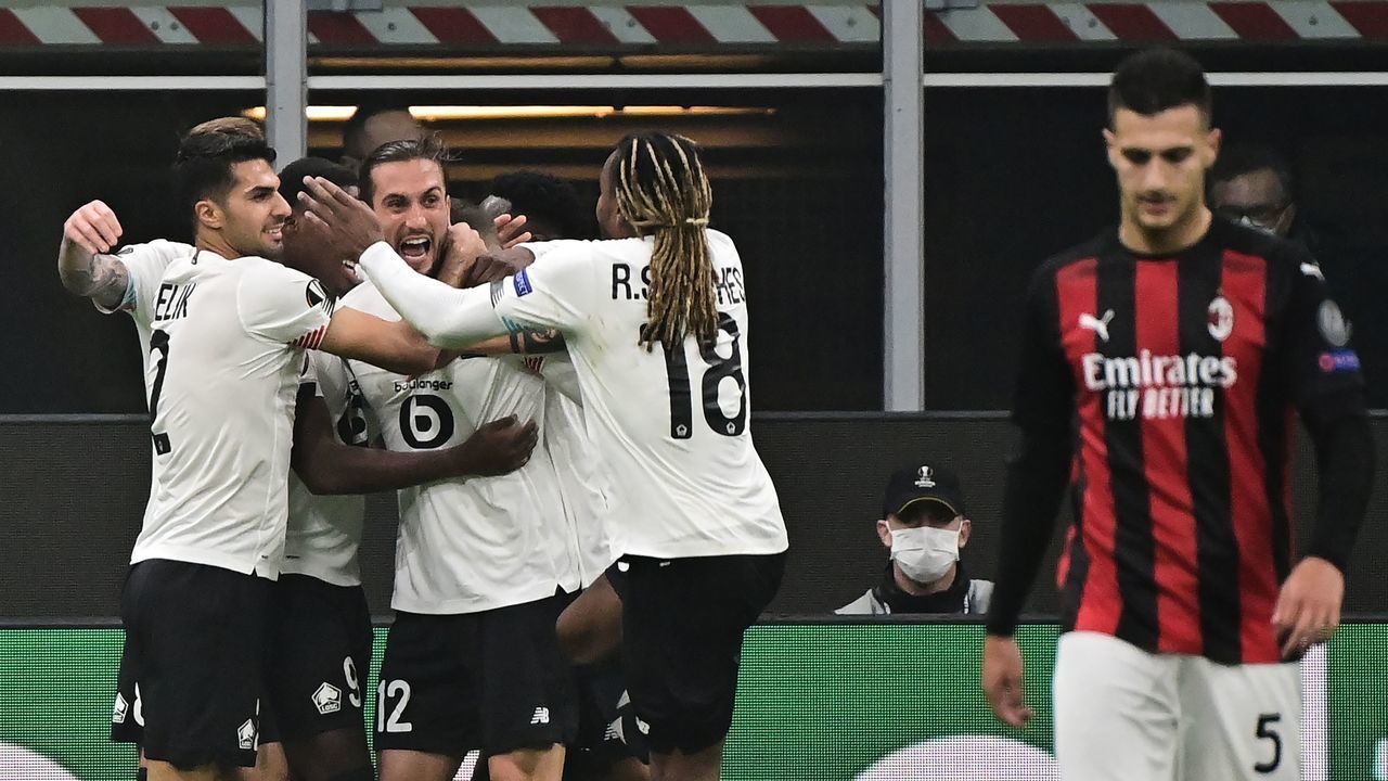 Lille's Turkish midfielder Yusuf Yazici celebrates with teammates after scoring a goal during the UEFA Europa League first round day three Group H football match between AC Milan and Lille (LOSC) at the Meazza stadium in Milan on November 5, 2020.