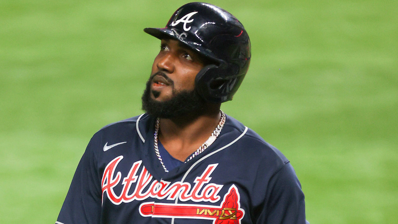 ARLINGTON, TEXAS - OCTOBER 18: Marcell Ozuna #20 of the Atlanta Braves flies out against the Los Angeles Dodgers during the third inning in Game Seven of the National League Championship Series at Globe Life Field on October 18, 2020 in Arlington, Texas.