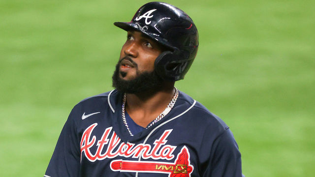 ARLINGTON, TEXAS - OCTOBER 18: Marcell Ozuna #20 of the Atlanta Braves flies out against the Los Angeles Dodgers during the third inning in Game Seven of the National League Championship Series at Globe Life Field on October 18, 2020 in Arlington, Texas.