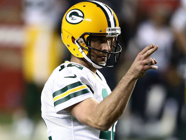 SANTA CLARA, CALIFORNIA - NOVEMBER 05: Aaron Rodgers #12 of the Green Bay Packers signals first down against the San Francisco 49ers during the third quarter at Levi's Stadium on November 05, 2020 in Santa Clara, California.