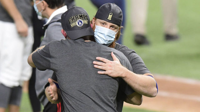 Baseball: World Series: Los Angeles Dodgers Justin Turner victorious, hugging teammate on field after winning game and series vs Tampa Bay Rays at Globe Life Field. Game 6. Arlington, TX 10/27/2020 CREDIT: Greg Nelson Photo by Greg Nelson/Sports Illustrated via Getty Images) (Set Number: X163437)