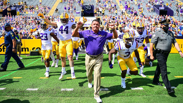 BATON ROUGE, LA - SEPTEMBER 26: Head coach Ed Orgeron leads the LSU Tigers onto the field before their game against the Mississippi State Bulldogs on September 26, 2020 at Tiger Stadium in Baton Rouge, Louisiana.