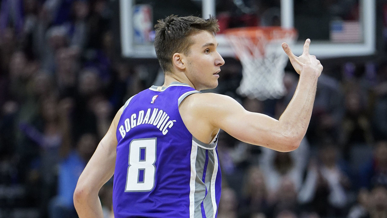 SACRAMENTO, CALIFORNIA - MARCH 08: Bogdan Bogdanovic #8 of the Sacramento Kings celebrates after making a three-point shot against the Toronto Raptors during the second half of an NBA basketball game at Golden 1 Center on March 08, 2020 in Sacramento, California.