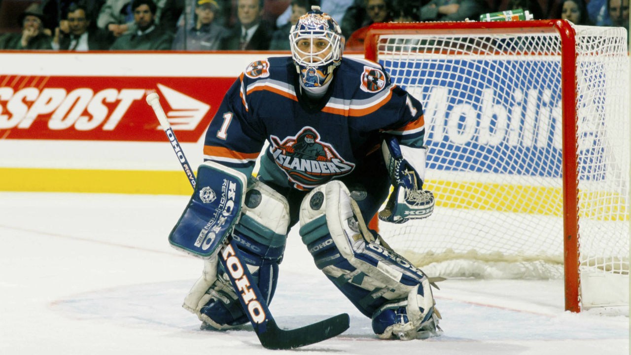 MONTREAL, CANADA- CIRCA 1996: Eric Fichaud #1 of the New York Islanders follows the action during a game against the Montreal Canadiens Circa 1996 at the Montreal Forum in Montreal, Quebec, Canada.