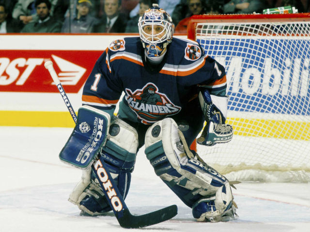 MONTREAL, CANADA- CIRCA 1996: Eric Fichaud #1 of the New York Islanders follows the action during a game against the Montreal Canadiens Circa 1996 at the Montreal Forum in Montreal, Quebec, Canada.
