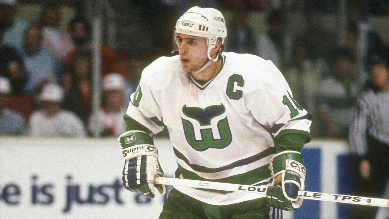 HARTFORD, CT - CIRCA 1990: Ron Francis #10 of the Hartford Whalers skates against the Boston Bruins during an NHL Hockey game circa 1990 at the Hartford Civic Center in Hartford, Connecticut. Francis's playing career went from 1981-2004.