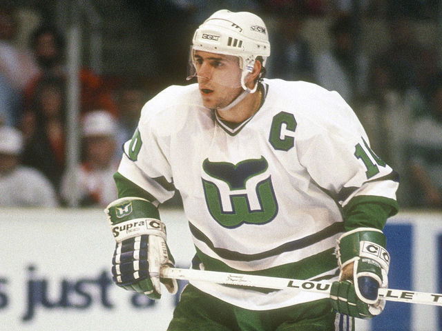HARTFORD, CT - CIRCA 1990: Ron Francis #10 of the Hartford Whalers skates against the Boston Bruins during an NHL Hockey game circa 1990 at the Hartford Civic Center in Hartford, Connecticut. Francis's playing career went from 1981-2004.