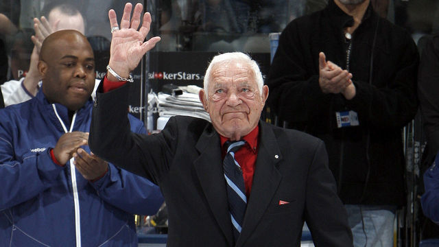 TORONTO, CANADA - MARCH 19 NHL Legend Howie Meeker waves to the fans during pre-game ceremony at the Air Canada Centre March 19, 2011 in Toronto, Ontario, Canada.