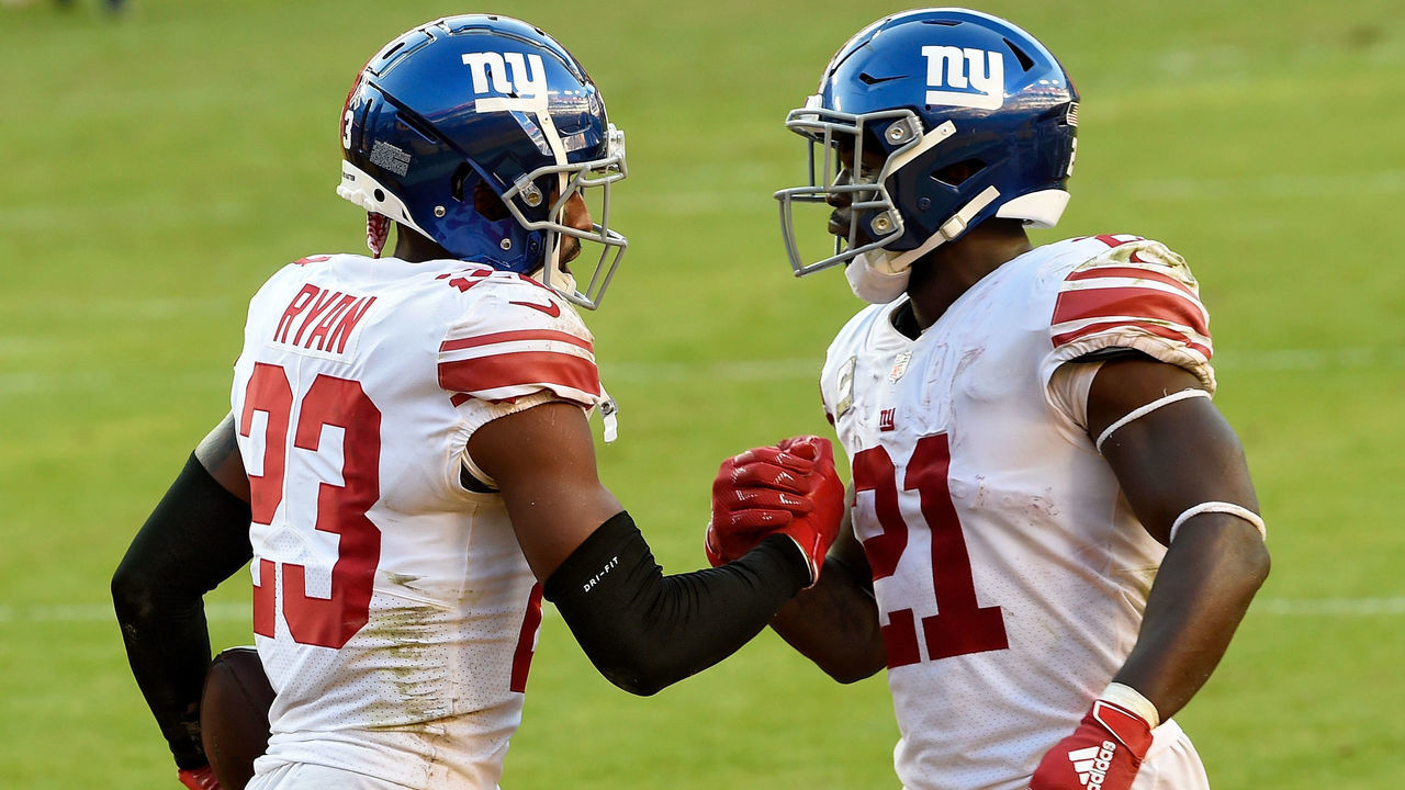 LANDOVER, MARYLAND - NOVEMBER 08: Logan Ryan #23 and Jabrill Peppers #21 of the New York Giants celebrate in the fourth quarter against the Washington Football Team at FedExField on November 08, 2020 in Landover, Maryland.
