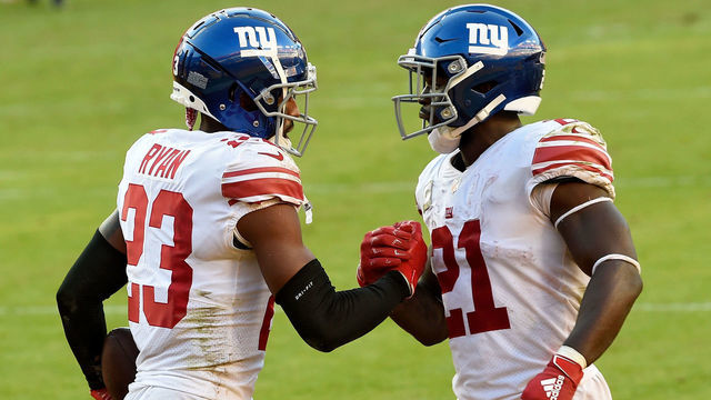 LANDOVER, MARYLAND - NOVEMBER 08: Logan Ryan #23 and Jabrill Peppers #21 of the New York Giants celebrate in the fourth quarter against the Washington Football Team at FedExField on November 08, 2020 in Landover, Maryland.