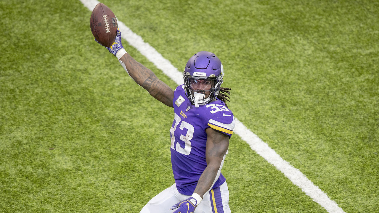 MINNEAPOLIS, MN,- NOVEMBER 8 - Minnesota Vikings running back Dalvin Cook held the ball up as he ran into the end zone for a 70-yard touchdown in the fourth quarter. The Minnesota Vikings played the Detroit Tigers at US Bank Stadium in Minneapolis, MN, Sunday, November 8, 2020.