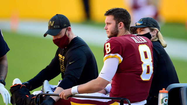 LANDOVER, MARYLAND - NOVEMBER 08: Kyle Allen #8 of the Washington Football Team is carted off the field after being injured in the first quarter against the New York Giants at FedExField on November 08, 2020 in Landover, Maryland.