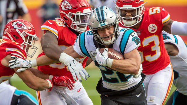KANSAS CITY, MO - NOVEMBER 08: Carolina Panthers running back Christian McCaffrey (22) tries to break tackles during the first half against the Kansas City Chiefs at Arrowhead Stadium in Kansas City, Missouri.