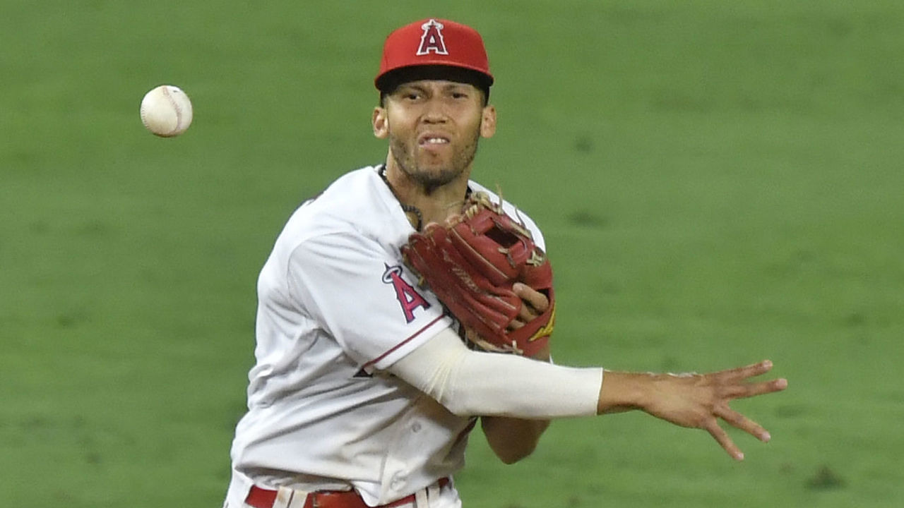 ANAHEIM, CA - AUGUST 29: Andrelton Simmons #2 of the Los Angeles Angels throws to first base while playing the Seattle Mariners at Angel Stadium of Anaheim on August 29, 2020 in Anaheim, California. All players are wearing #42 in honor of Jackie Robinson Day. The day honoring Jackie Robinson, traditionally held on April 15, was rescheduled due to the COVID-19 pandemic. The Angels won 16-3.
