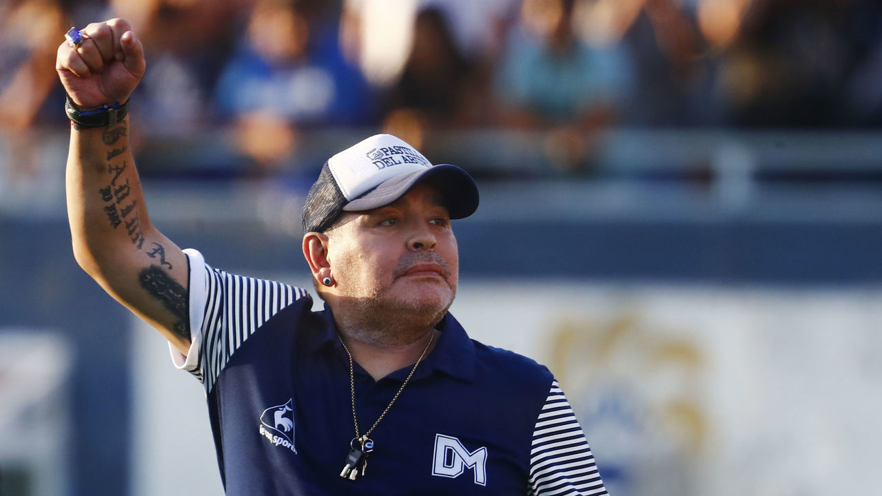 LA PLATA, ARGENTINA - FEBRUARY 29: Diego Armando Maradona head coach of Gimnasia y Esgrima La Plata gestures to supporters during a match between Gimnasia y Esgrima La Plata and Atletico Tucuman as part of Superliga 2019/20 at Estadio Juan Carlos Zerillo on February 29, 2020 in La Plata, Argentina.