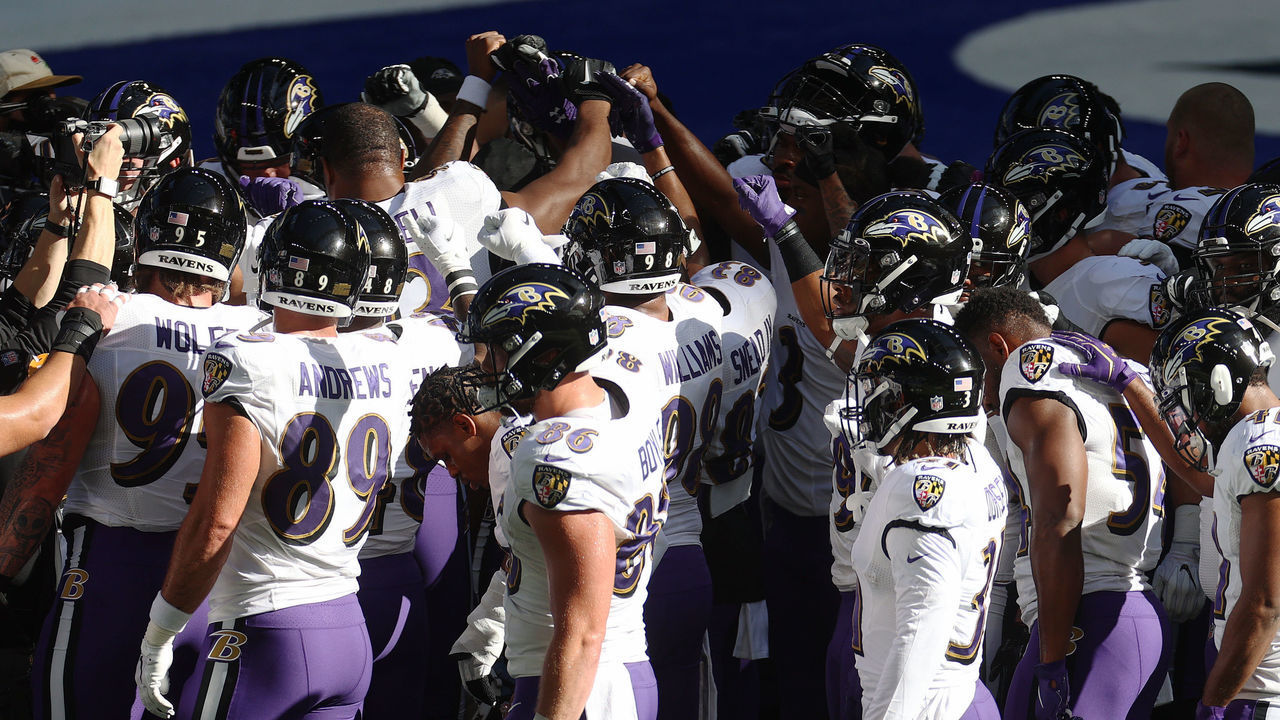 INDIANAPOLIS, INDIANA - NOVEMBER 08: Members of the Baltimore Ravens huddle during warm ups before a game against the Indianapolis Colts at Lucas Oil Stadium on November 08, 2020 in Indianapolis, Indiana.