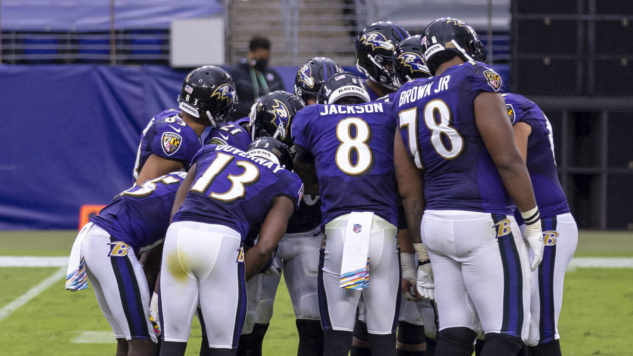 BALTIMORE, MD - OCTOBER 11: Lamar Jackson #8 of the Baltimore Ravens leads an offensive huddle during the second half of the game against the Cincinnati Bengals at M&T Bank Stadium on October 11, 2020 in Baltimore, Maryland.
