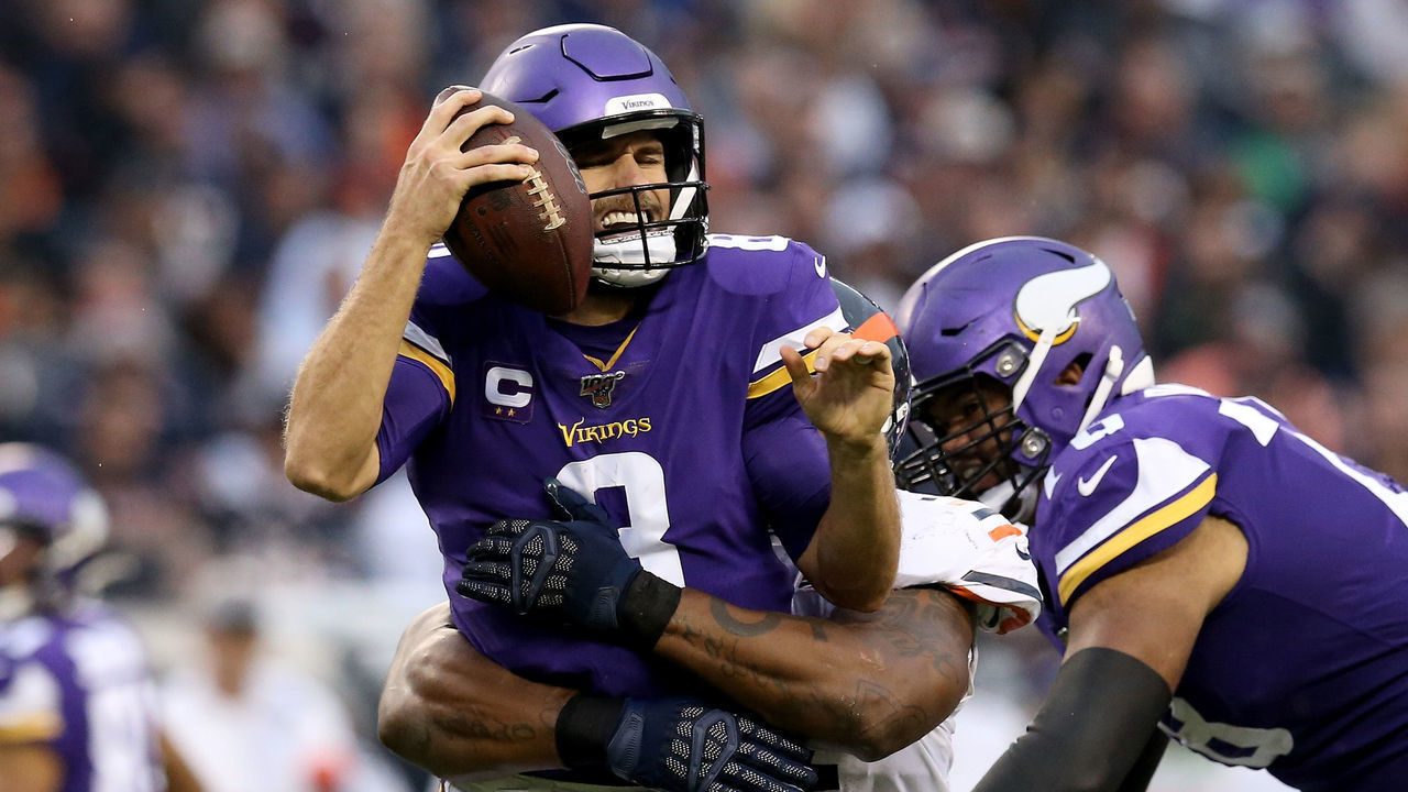 CHICAGO, ILLINOIS - SEPTEMBER 29: Nick Williams #97 of the Chicago Bears sacks Kirk Cousins #8 of the Minnesota Vikings in the third quarter at Soldier Field on September 29, 2019 in Chicago, Illinois.