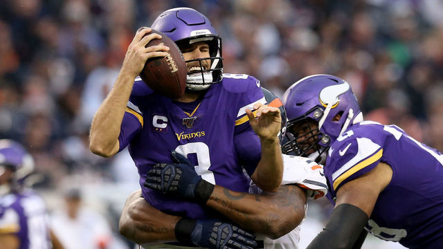 CHICAGO, ILLINOIS - SEPTEMBER 29: Nick Williams #97 of the Chicago Bears sacks Kirk Cousins #8 of the Minnesota Vikings in the third quarter at Soldier Field on September 29, 2019 in Chicago, Illinois.