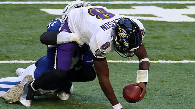 INDIANAPOLIS, INDIANA - NOVEMBER 08: Al-Quadin Muhammad #97 of the Indianapolis Colts sacks Lamar Jackson #8 of the Baltimore Ravens during the second quarter at Lucas Oil Stadium on November 08, 2020 in Indianapolis, Indiana.