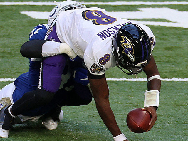 INDIANAPOLIS, INDIANA - NOVEMBER 08: Al-Quadin Muhammad #97 of the Indianapolis Colts sacks Lamar Jackson #8 of the Baltimore Ravens during the second quarter at Lucas Oil Stadium on November 08, 2020 in Indianapolis, Indiana.