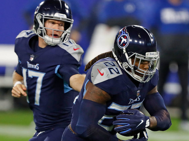 NASHVILLE, TENNESSEE - NOVEMBER 12: Ryan Tannehill #17 hands the ball to Derrick Henry #22 of the Tennessee Titans during the first half against the Indianapolis Colts at Nissan Stadium on November 12, 2020 in Nashville, Tennessee.