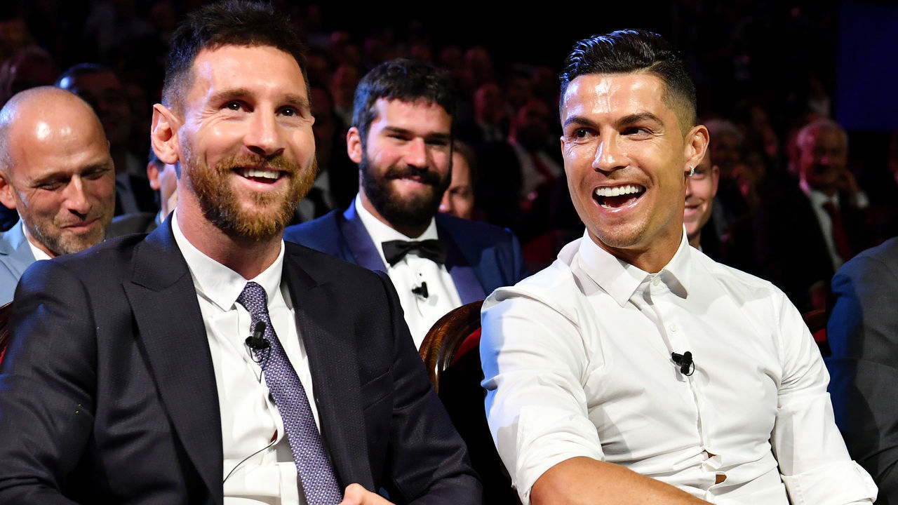 MONACO, MONACO - AUGUST 29: Cristiano Ronaldo of Juventus, Lionel Messi of FC Barcelona and Virgil Van Dijk of Liverpool react during the UEFA Champions League Draw, part of the UEFA European Club Football Season Kick-Off 2019/2020 at Salle des Princes, Grimaldi Forum on August 29, 2019 in Monaco, Monaco.