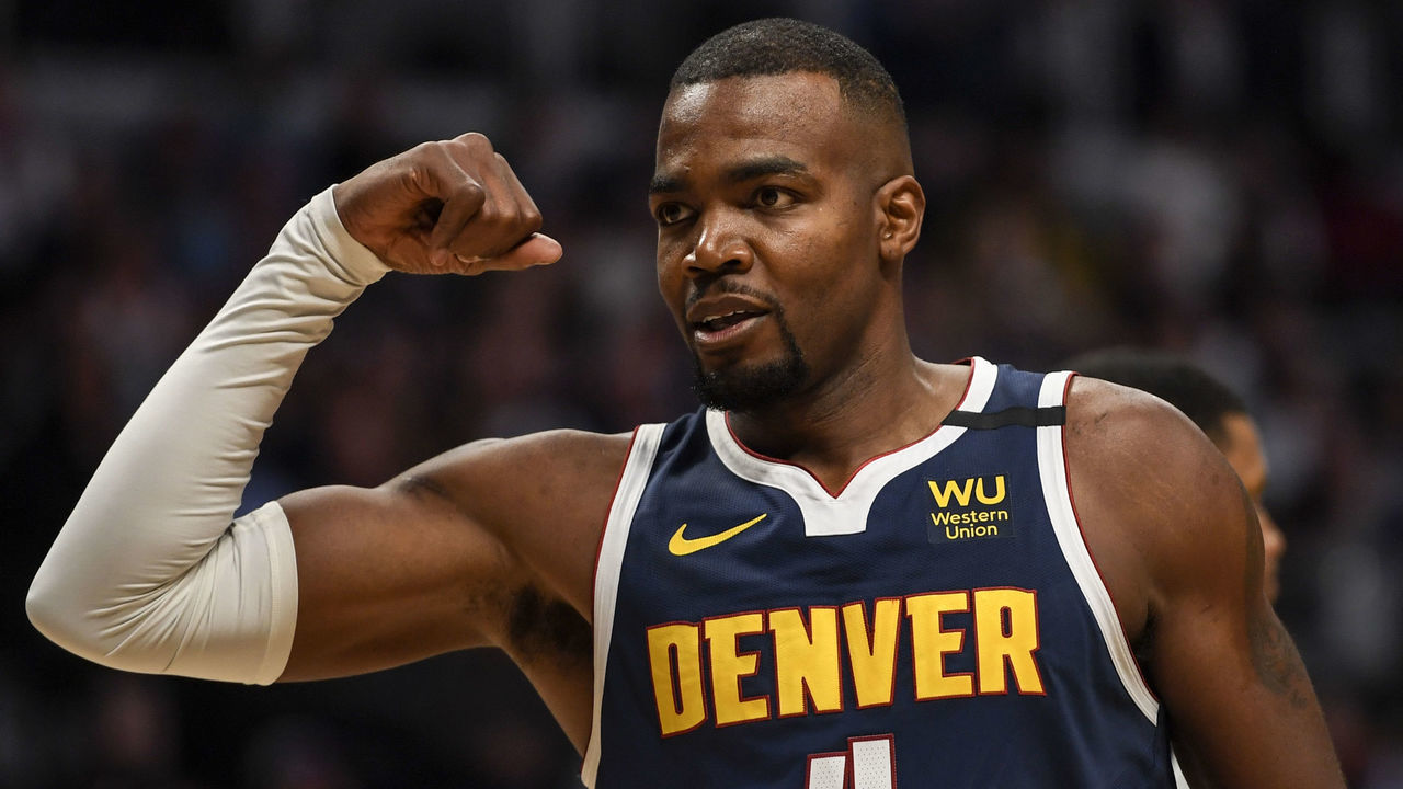 DENVER, CO - FEBRUARY 10: Paul Millsap (4) of the Denver Nuggets flexes after getting an and-one attempt against the San Antonio Spurs during the third quarter on Monday, February 10, 2020.