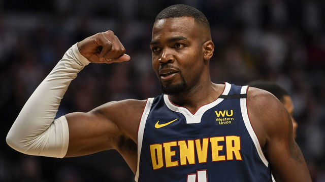 DENVER, CO - FEBRUARY 10: Paul Millsap (4) of the Denver Nuggets flexes after getting an and-one attempt against the San Antonio Spurs during the third quarter on Monday, February 10, 2020.