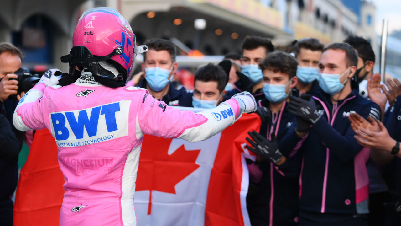 ISTANBUL, TURKEY - NOVEMBER 14: Pole position qualifier Lance Stroll of Canada and Racing Point celebrates with team members in parc ferme during qualifying ahead of the F1 Grand Prix of Turkey at Intercity Istanbul Park on November 14, 2020 in Istanbul, Turkey.