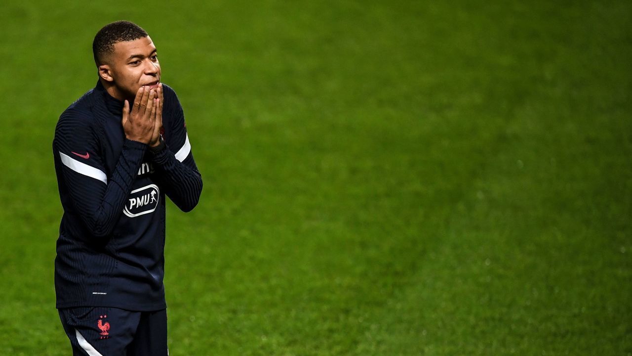 France's forward Kylian Mbappe gestures during a training session at the Luz stadium in Lisbon on November 13, 2020 on the eve of the UEFA Nations League A group 3 football match between Portugal and France.