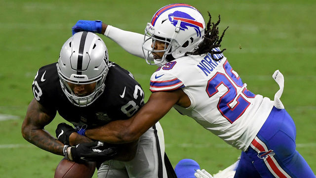 LAS VEGAS, NEVADA - OCTOBER 04: Cornerback Josh Norman #29 of the Buffalo Bills knocks the ball away from tight end Darren Waller #83 of the Las Vegas Raiders during the second half of the NFL game at Allegiant Stadium on October 4, 2020 in Las Vegas, Nevada. Norman recovered the fumble. The Bills defeated the Raiders 30-23.