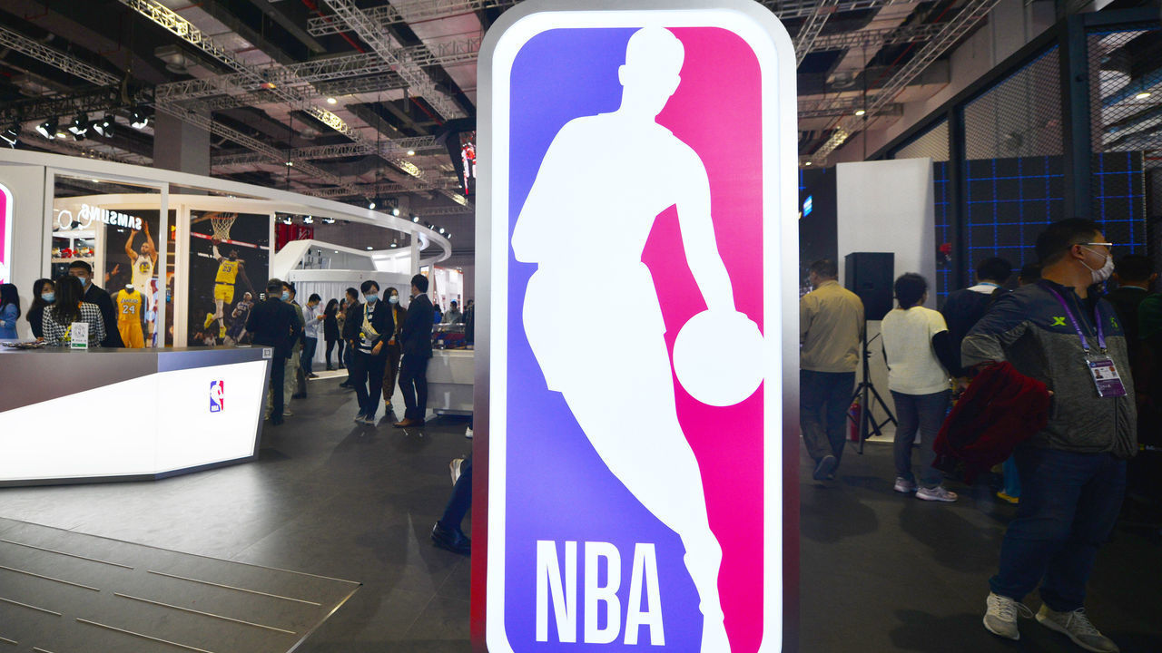 SHANGHAI, CHINA - NOVEMBER 09: People visit the NBA stand during the 3rd China International Import Expo (CIIE) at the National Exhibition and Convention Center on November 9, 2020 in Shanghai, China.