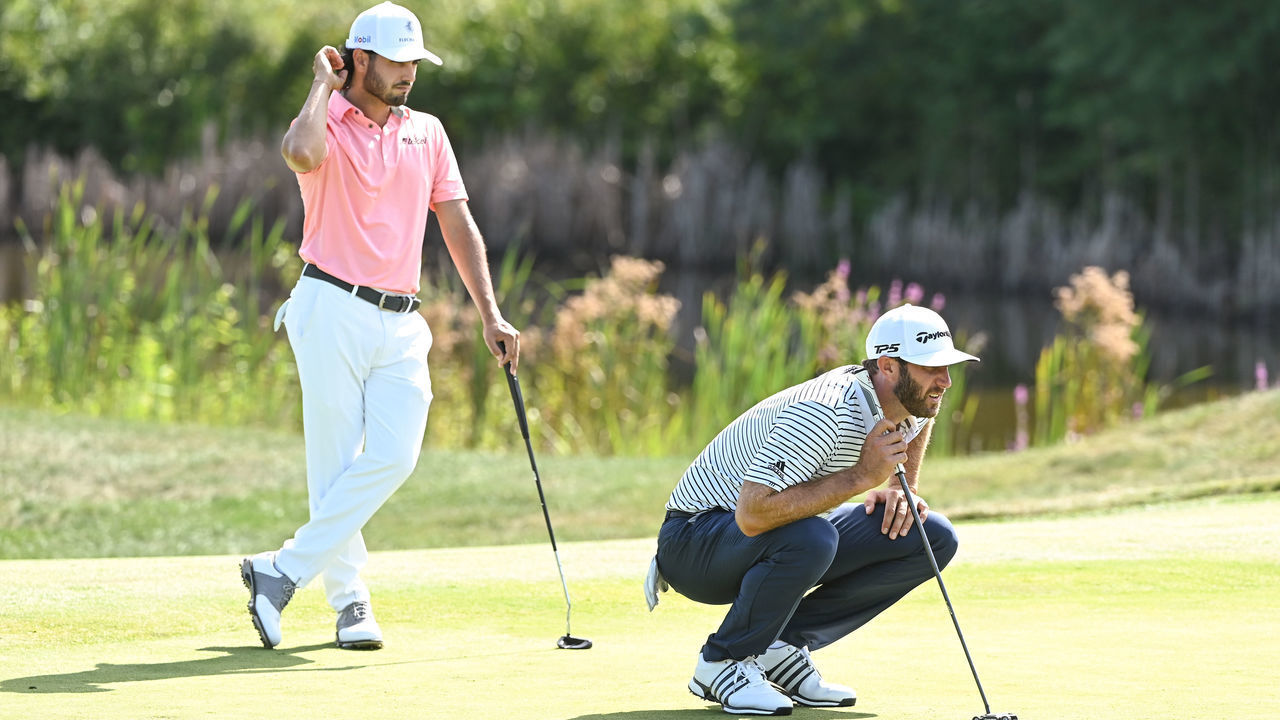 NORTON, MA - AUGUST 21: Abraham Ancer of Mexico and Dustin Johnson play the 10th green during the second round of THE NORTHERN TRUST at TPC Boston on August 21, 2020 in Norton, Massachusetts.