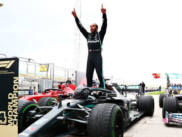 Winner Mercedes' British driver Lewis Hamilton with the trophy on the  News Photo - Getty Images